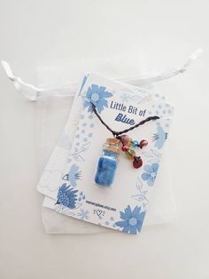 "✧Little Bit of Blue | DSMP Jewelry | MCYT Ghostbur Philza TommyInnit✧ This Little Bottle of Blue necklace is a whimsical jewelry piece ! The bottle is full of \"blue\". have some blue! Calm yourself. It is also perfect for anyone who wants some DSMP/Techno/Philza/Wilbur/Tommy merch but prefers something a little more subtle. Because we think these also make for a fantastic gift we have a custom gift note design for any orders marked as a gift. Just let us know what message you would like writte Wilbur Tommy, Calm Yourself, Fidget Necklace, Cosplay Jewelry, Pretty Jewelry Necklaces, Whimsical Jewelry, Mushroom Decor, Dream Gift, Notes Design