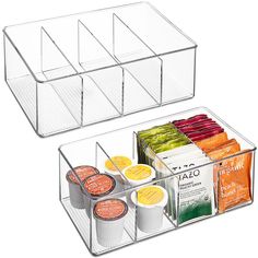 two clear storage bins filled with different types of food and condiments on top of each other