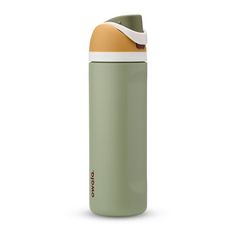 thermos bottle is green and yellow with a white cap on it's side