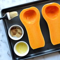 an image of some food on a tray with utensils and other things to eat