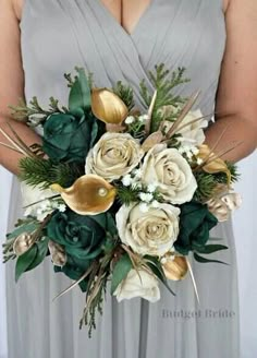 a bridesmaid holding a bouquet of white and green flowers