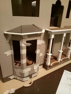 the doll house is being built and ready to be put in