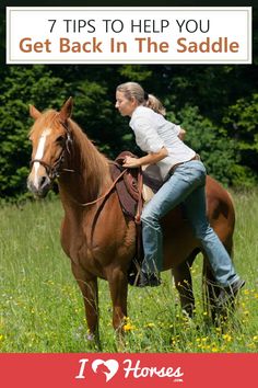 a woman riding on the back of a brown horse in a field with trees behind her