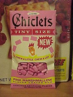 a bag of pink marshmallows sitting on top of a shelf