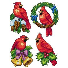 the cross stitch pattern shows two red birds with bells and holly wreaths