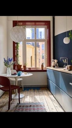 the kitchen is clean and ready to be used as a dining room or living area