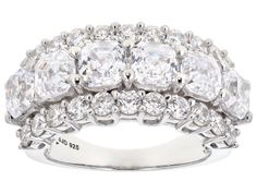 a diamond ring with three rows of diamonds on it