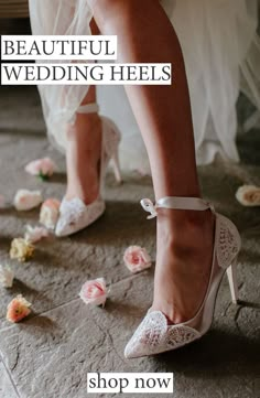 the bride's shoes are on the floor with rose petals scattered around them in front of her