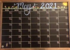 a chalkboard calendar with the date may 2012 written on it