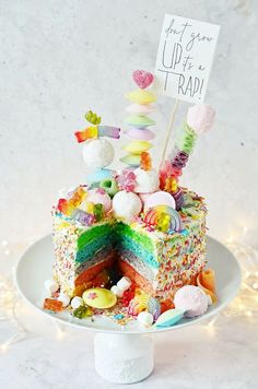 there is a cake that has been decorated with candies