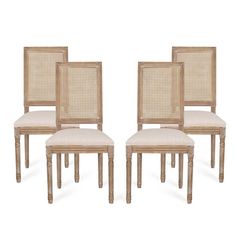 set of four cane back dining chairs with beige upholstered seat cushions, side view