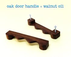 there are two wooden hooks on each side of the door handle, and one is made out of wood