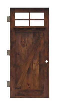 the front door is made from wood and has an iron bar at the top, with two