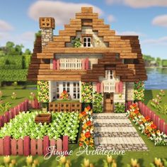 a house with flowers and plants around it