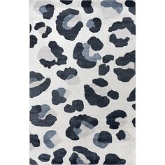 an animal print rug with black and white spots