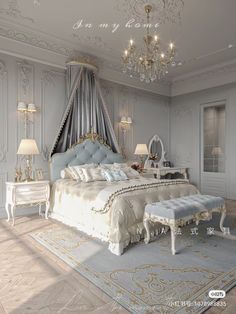 a large bed sitting in a bedroom next to a chandelier