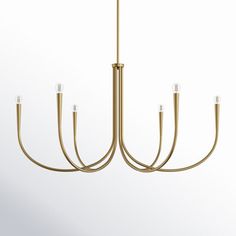 a large brass chandelier with five lights hanging from it's center point