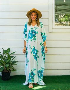 Embrace the essence of summer with our Hibiscus Floral Boho Kaftan Dress. This handmade kaftan, ideal for beachwear, loungewear, and as a swimsuit cover-up, captures the tropical Hawaiian vibe. Crafted from premium rayon, it promises comfort and style in equal measure.  Features ‣ Boho/Hippie/Hawaiian/Beach/Tropical Theme: Perfect for a relaxed, stylish look suitable for various occasions. ‣ Loose Fit: Designed to provide maximum comfort with a relaxed fit. ‣ Adjustable Rope: Features an adjusta Tropical V-neck Maxi Dress For The Beach, Floral Print Flowy Maxi Cover-up, Tropical V-neck Kaftan For Beach Cover-up, Floral Print V-neck Cover-up For Vacation, Tropical V-neck Kaftan For Summer, Hawaiian V-neck Vacation Dress, Bohemian Sarong For Resort Season, Tropical Green Kaftan For Beach Cover-up, Bohemian Sarong For Resort Season Vacation