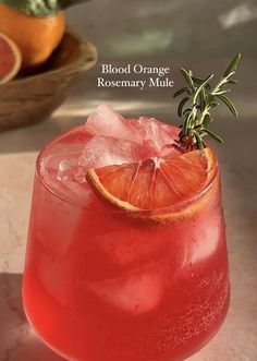 blood orange rosemary mule in a glass with ice