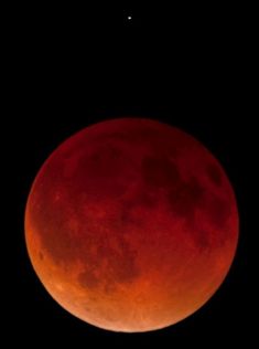 the blood moon is seen in this image