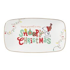 snoopy christmas platter with the words, have yourself a very snowy christmas on it