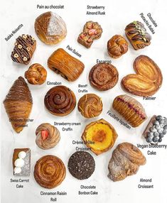 a bunch of different types of pastries on a white surface with words in the middle