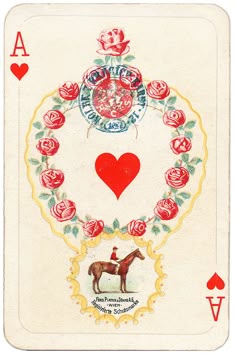 a playing card with an image of a horse in the middle and roses around it