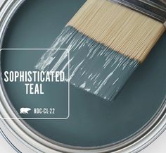 a paint can with a brush in it and the words sophisticated teal above it