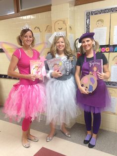 three girls dressed up in costumes and holding their book's for the little princess