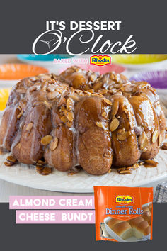 there is a cake with almonds on it and an advertisement for the dessert clock