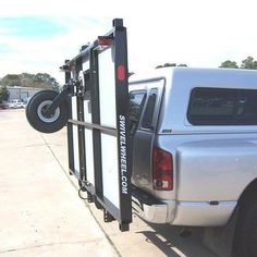 the truck is parked on the side of the road