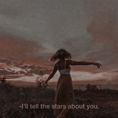 a woman standing on top of a lush green field under a cloudy sky with the words, i'll'll tell the stars about you