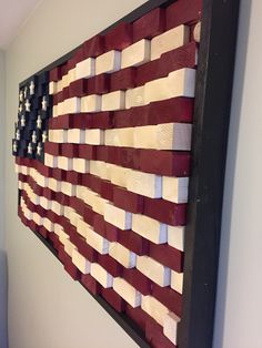 an american flag made out of strips of wood