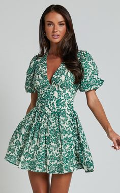 Nelli Mini Dress - Short Puff Sleeve Shirred Back Dress in Green Silhouette | Showpo USA Green Fit And Flare V-neck Dress, Green V-neck Fit And Flare Dress, Green Puff Sleeve Dress For Summer, Green Puff Sleeve Knee-length Dress For Summer, Green Knee-length Puff Sleeve Summer Dress, Green Puff Sleeve Dress For Garden Party, Green Puff Sleeve Dress With Floral Print, Chic Green Puff Sleeve Dress For Garden Party, Green Fitted Puff Sleeve Dress For Garden Party