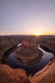 the sun is setting over horseshoe point in canyon district, colorado's grand canyon national park