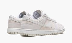 The Nike Dunk Low PRM “Vast Grey" is a March 2022 release of the classic sneaker in a colorway with a buttery all-suede construction.  The “Vast Grey” features a low contrast, two-tone grey design.  Specifically, a slightly darker, warmer shade of grey suede is found on the perforated toe, mid-panel, collar, and heel.  A lighter version of grey suede appears on the overlays and Swoosh.  Tonal “Nike” branding can be found on the shoe’s heel.  The “Nike” and Swoosh detailing on the tongue tag arri Meds For Dogs, Designer Outlet, Gray Design, Grey Shoes, Nike Dunk Low, Classic Sneakers, Gray Suede, Cool Tones, Dunk Low