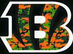 the letter b is made up of orange and green camo print with black letters