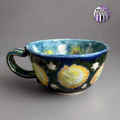 handmade ceramic mug with sun moon stars pattern - blue, yellow, white, orange, green Ceramic Sun And Moon, Pottery Sun, Ceramic Sun, Ceramic Eye, Witch Board, Clay Bowl, Candle Plate, Occult Art, Sun Moon Stars