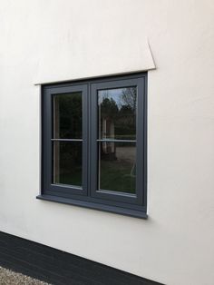 an image of a window that is on the side of a building