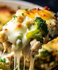 a spoon full of broccoli and cheese casserole