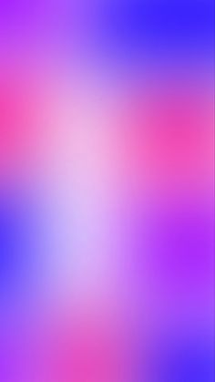 an abstract blurry background in pink and blue