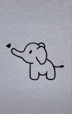 an elephant with a heart drawn on it