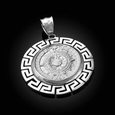 Sterling Silver Aztec Bezel, Satin Finish Mayan Sun Calendar Medallion Pendant. Metal: 925 Sterling Silver.Weight: 7.5 g.Height (w/ bail): 1.5" (40 mm).Pendant Width: 1.1" (29 mm).Bail opening: 5 mm.Finish: polished bezel, satin calendar.Back: solid.Made in the USA. Sun Calendar, Mayan Sun, Sun Stone, Christian Jewelry, Hip Hop Jewelry, Timeless Accessories, Religious Jewelry, Silver Pendants