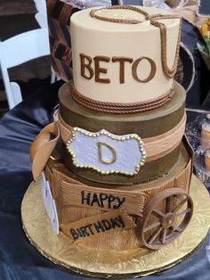 a birthday cake made to look like an old time wagon with the word beto on it