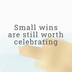 the words small wins are still worth celebrating on a blue and white background with gold paint