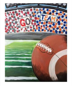 a painting of a football and goal post on the side of a stadium with words go team