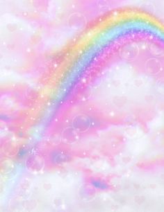 a rainbow in the sky with bubbles and stars