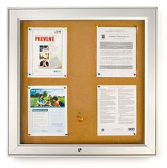 a bulletin board with papers on it and magnets attached to the cork notice board