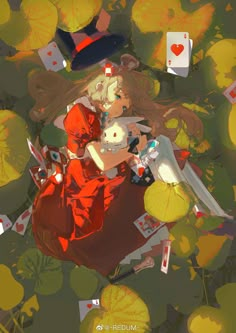 an aerial view of a woman holding a teddy bear in her arms surrounded by playing cards and umbrellas