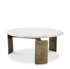 a white marble coffee table with two metal legs and an oval shaped design on the top